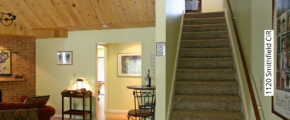 Carpeted stairs leading to the second floor. Bar-height table with two chairs and a bar cart.