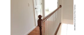 Hallway with wood floors