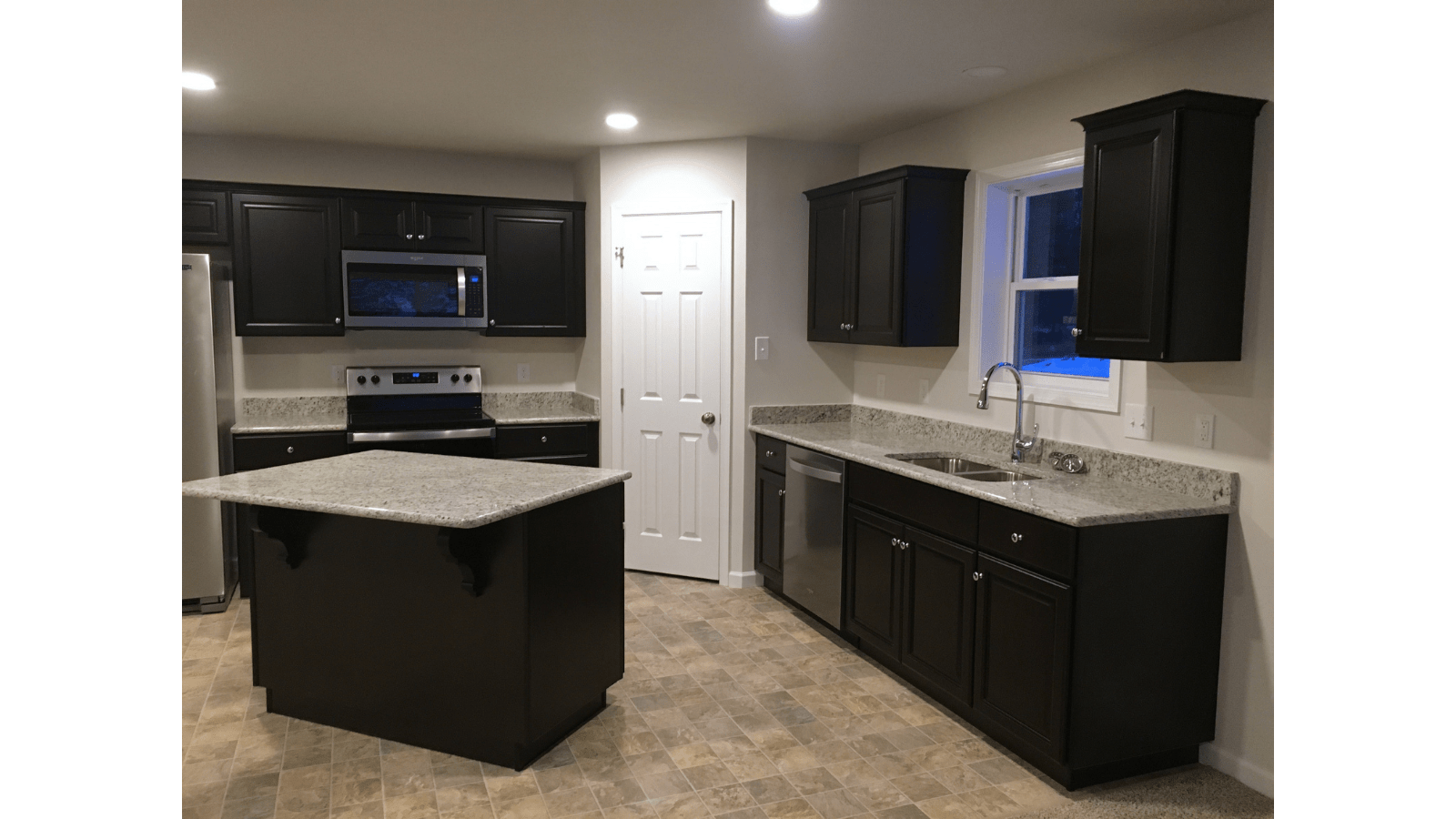 Modern dark wood kitchen with island