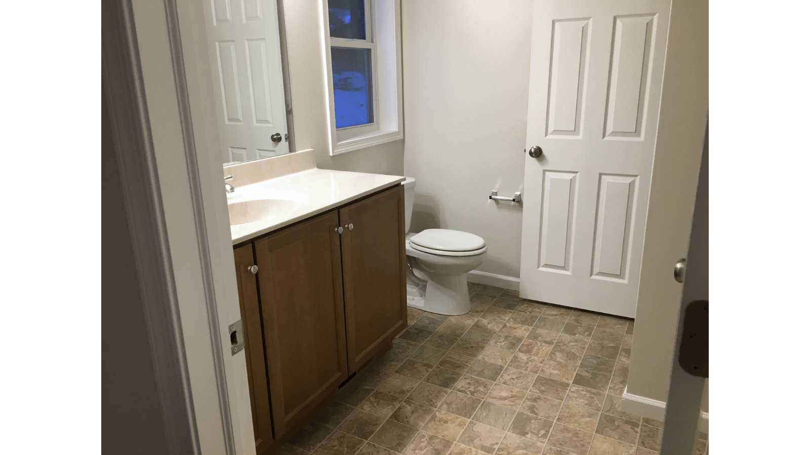 Modern bathroom with vanity and toilet