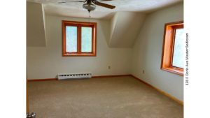 Unfurnished bedroom with carpet, ceiling fan with a light, and crank windows