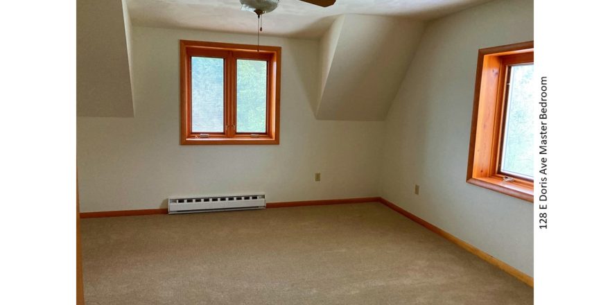 Unfurnished bedroom with carpet, ceiling fan with a light, and crank windows