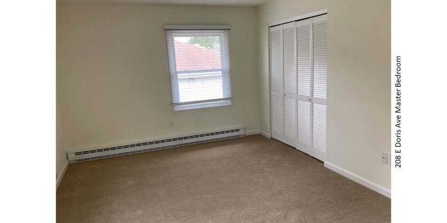 Unfurnished, carpeted bedroom with closet