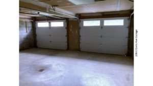 Garage with two garage doors.