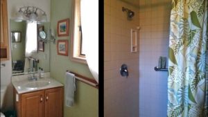 Bathroom with shower, basin and mirror