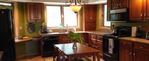 Kitchen with table and cabinets