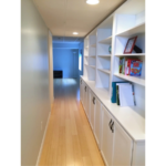 Hallway with large shelving unit