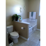 Bathroom with tub and toilet