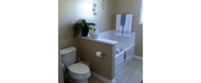 Bathroom with tub and toilet