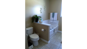 Bathroom with tub and toilet