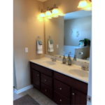 Double sink vanity with large mirror