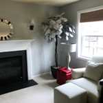 Furnished, carpeted living room with gas fireplace