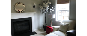 Furnished, carpeted living room with gas fireplace