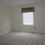 Unfurnished carpeted bedroom