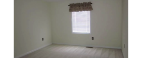 Unfurnished carpeted bedroom