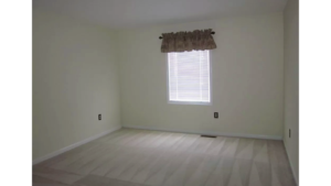 Unfurnished carpeted bedroom