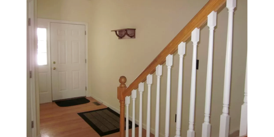 Entryway with stairwell to second floor