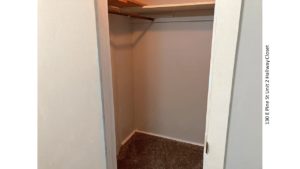 Empty, carpeted closet