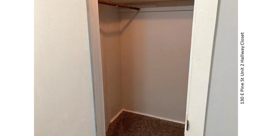 Empty, carpeted closet