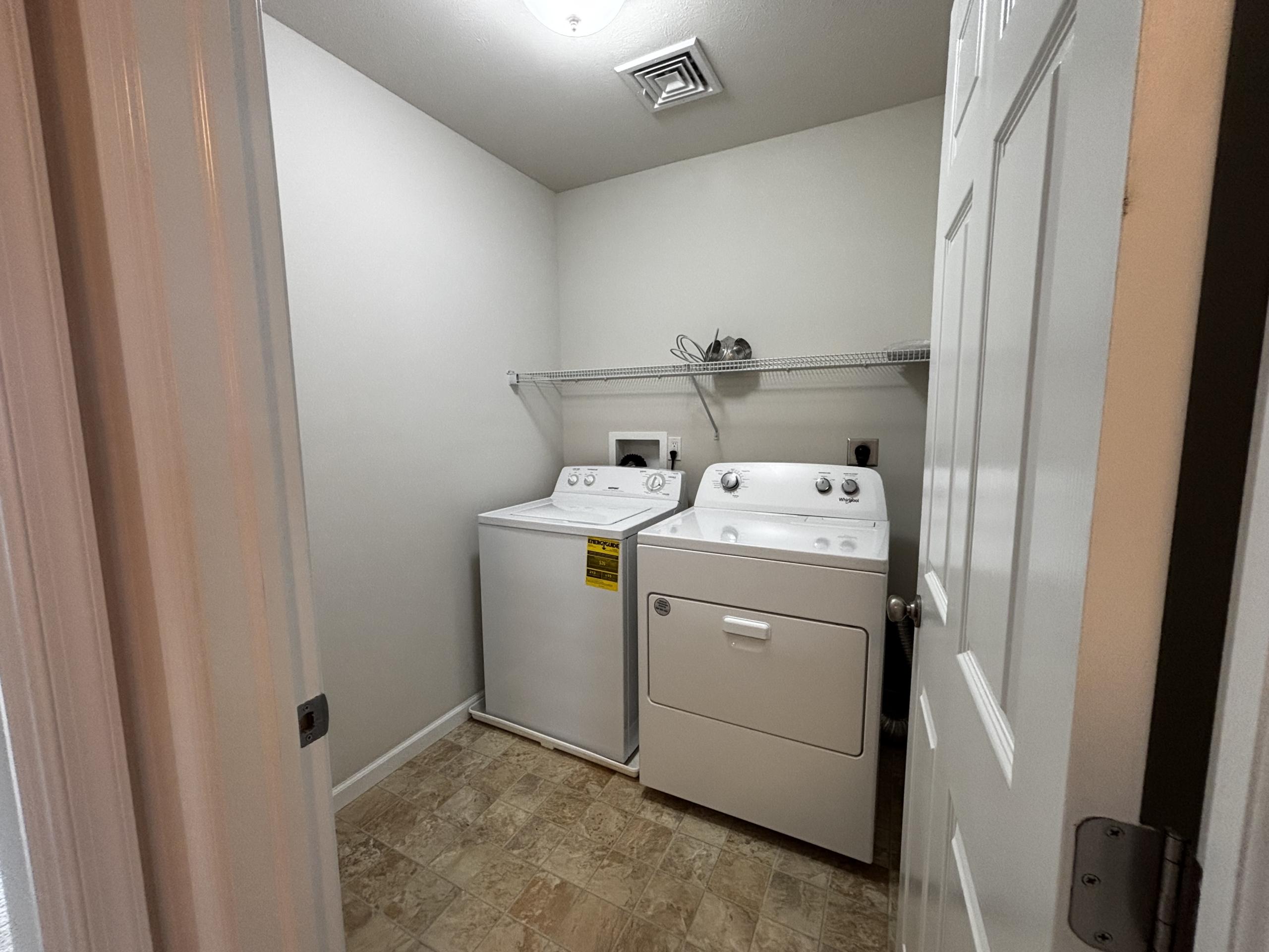 Laundry room with washer and dryer