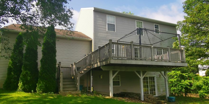 Back of 2015 Muncy Road with large deck, basement walk-out and yard