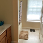 Bathroom with vanity and tub/shower combo