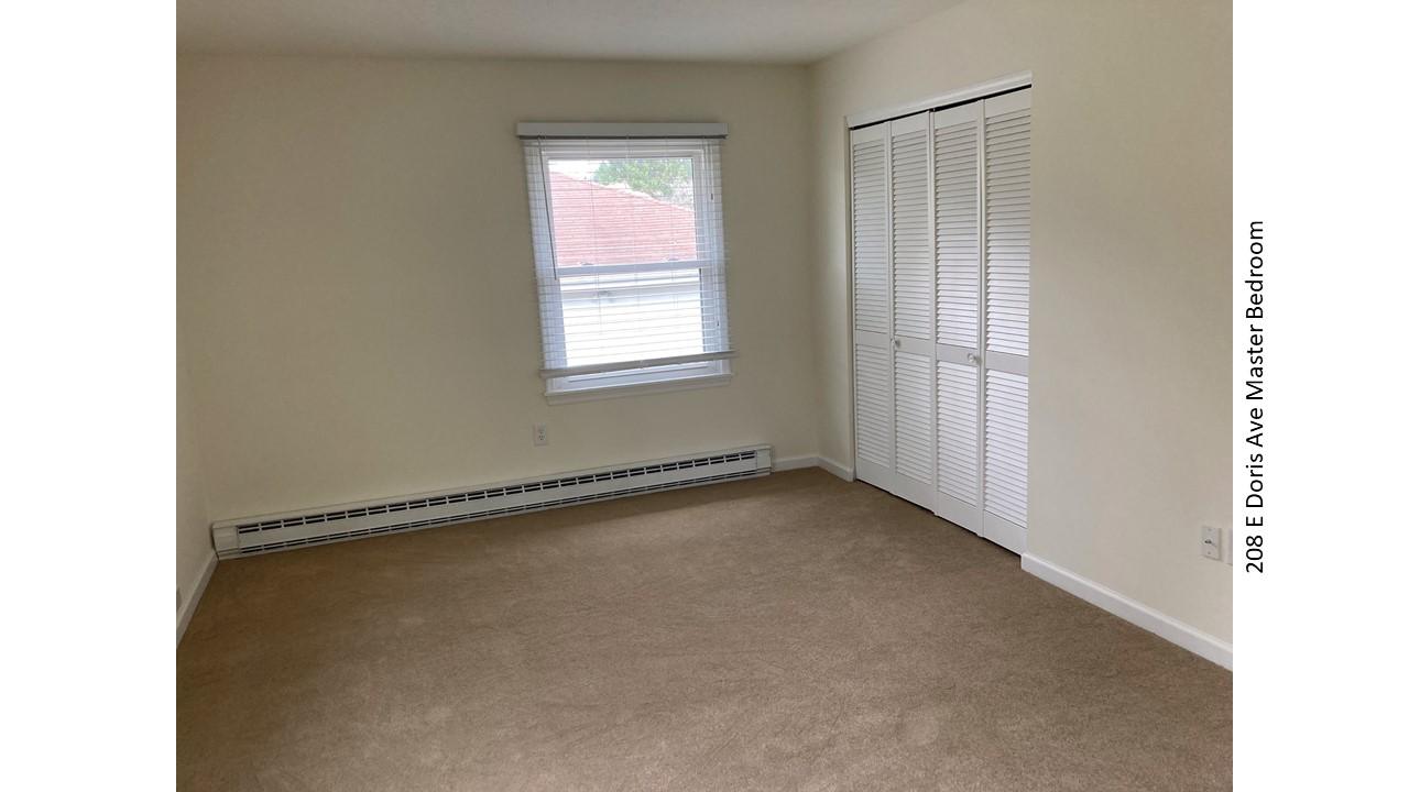 Bedroom with closet and window