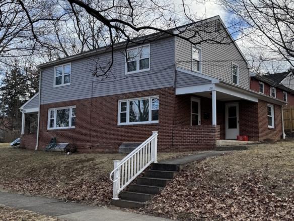 Two-story brick and siding house at 216 Easterly Pkwy