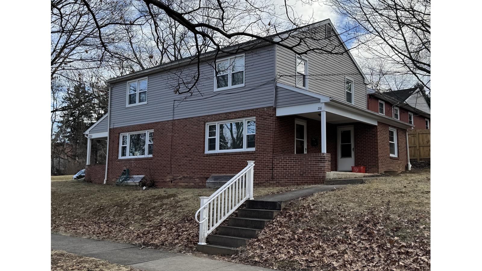 Two-story brick and siding house at 216 Easterly Pkwy