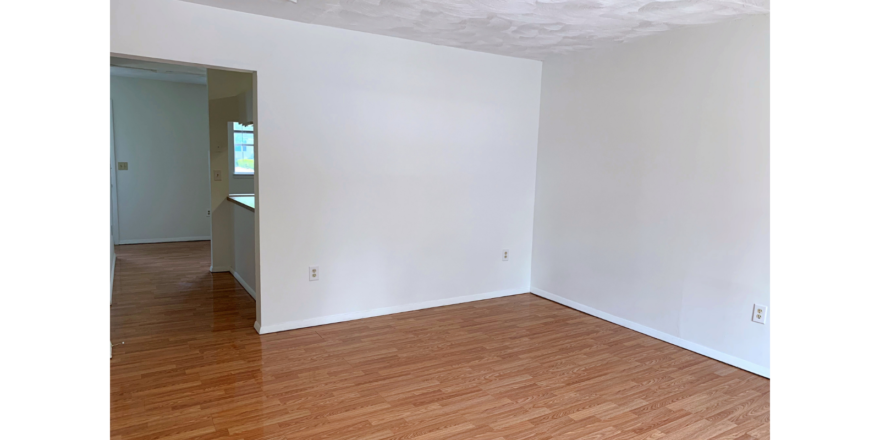 Living room with wood-style flooring