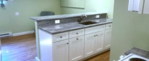 Kitchen counter with sink and cabinet space underneath