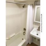 Bathroom with sink, medicine cabinet, and tub/shower combo