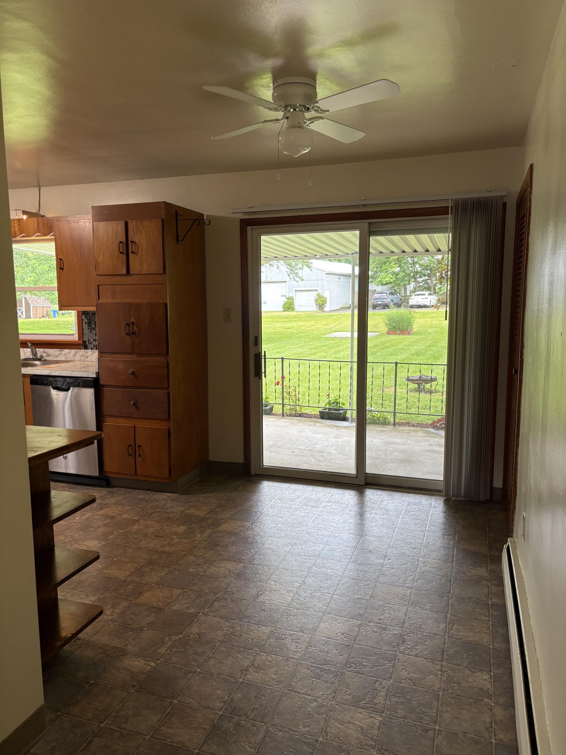 Kitchen with sliding glass door to yard