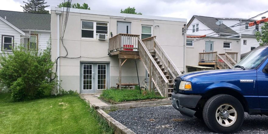 Gravel parking lot and patio