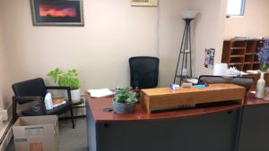 Reception area with desk and chairs