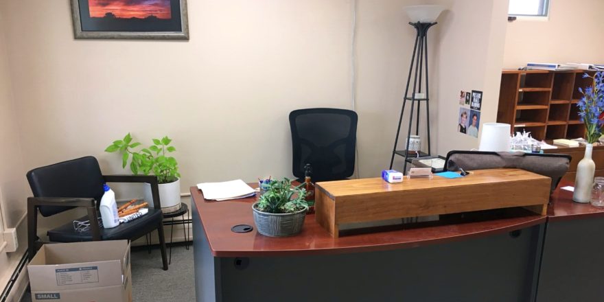 Reception area with desk and chairs