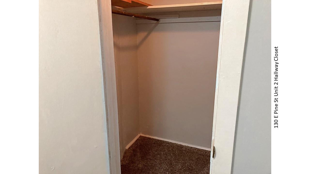 Empty hallway closet at 130 E Pine St