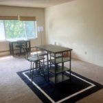 Living room with two desks and chairs