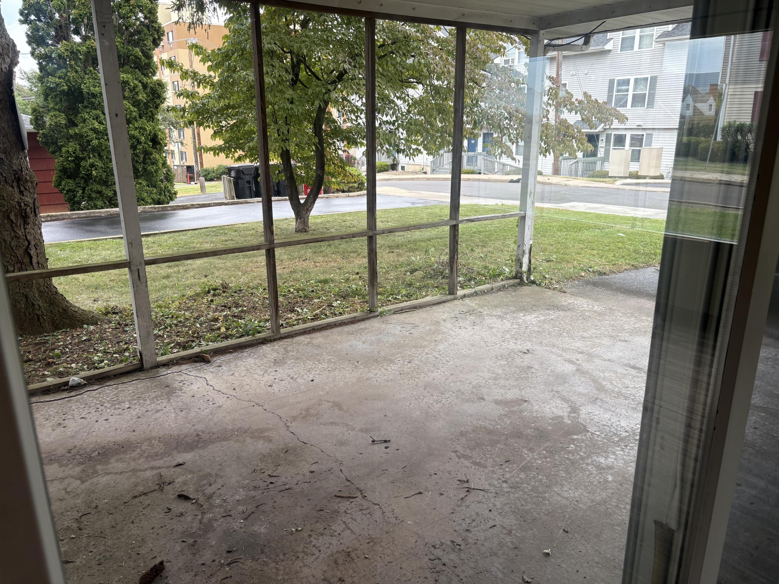Screened porch at 136 Keller St