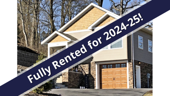 a blue and white sign that says fully rented for sale