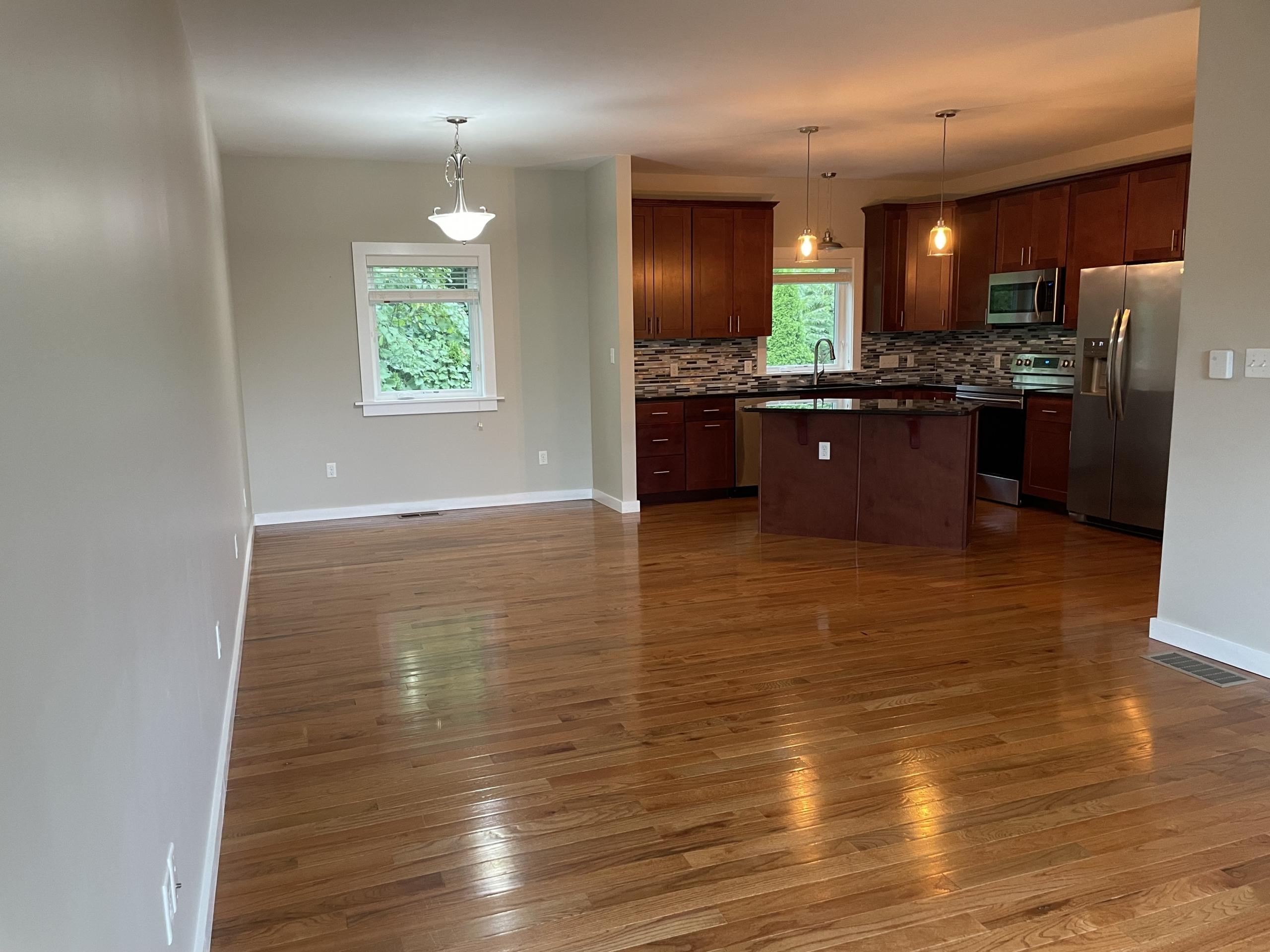 Open-concept dining and kitchen area