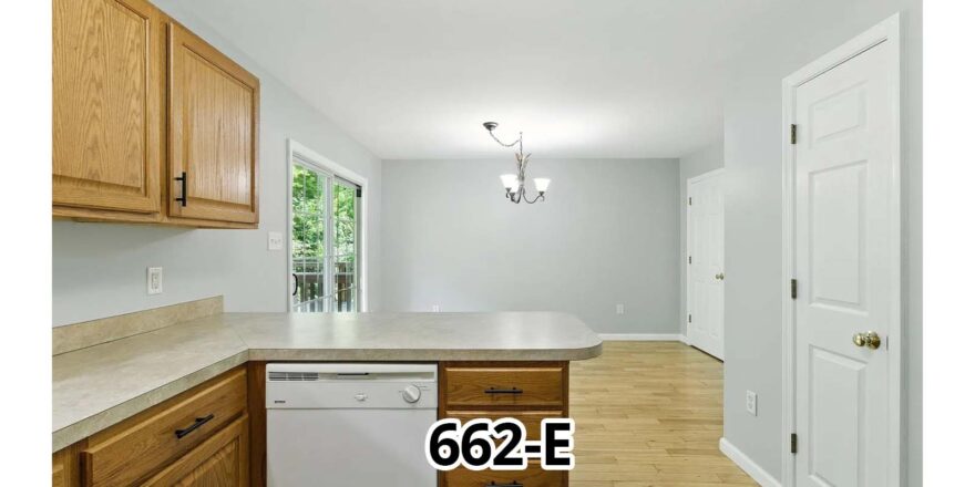 a kitchen with a white refrigerator freezer sitting inside of it