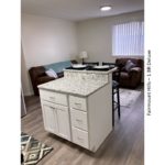 Kitchen island and furnished living room