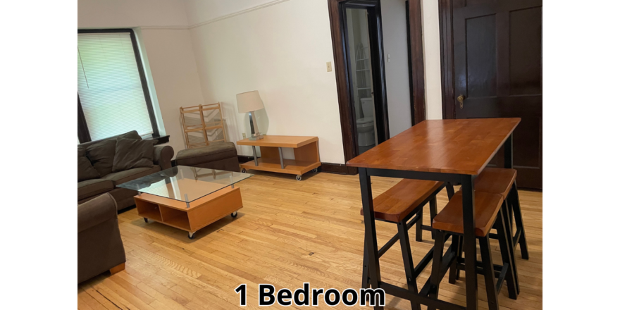 a living room filled with furniture and a wooden floor