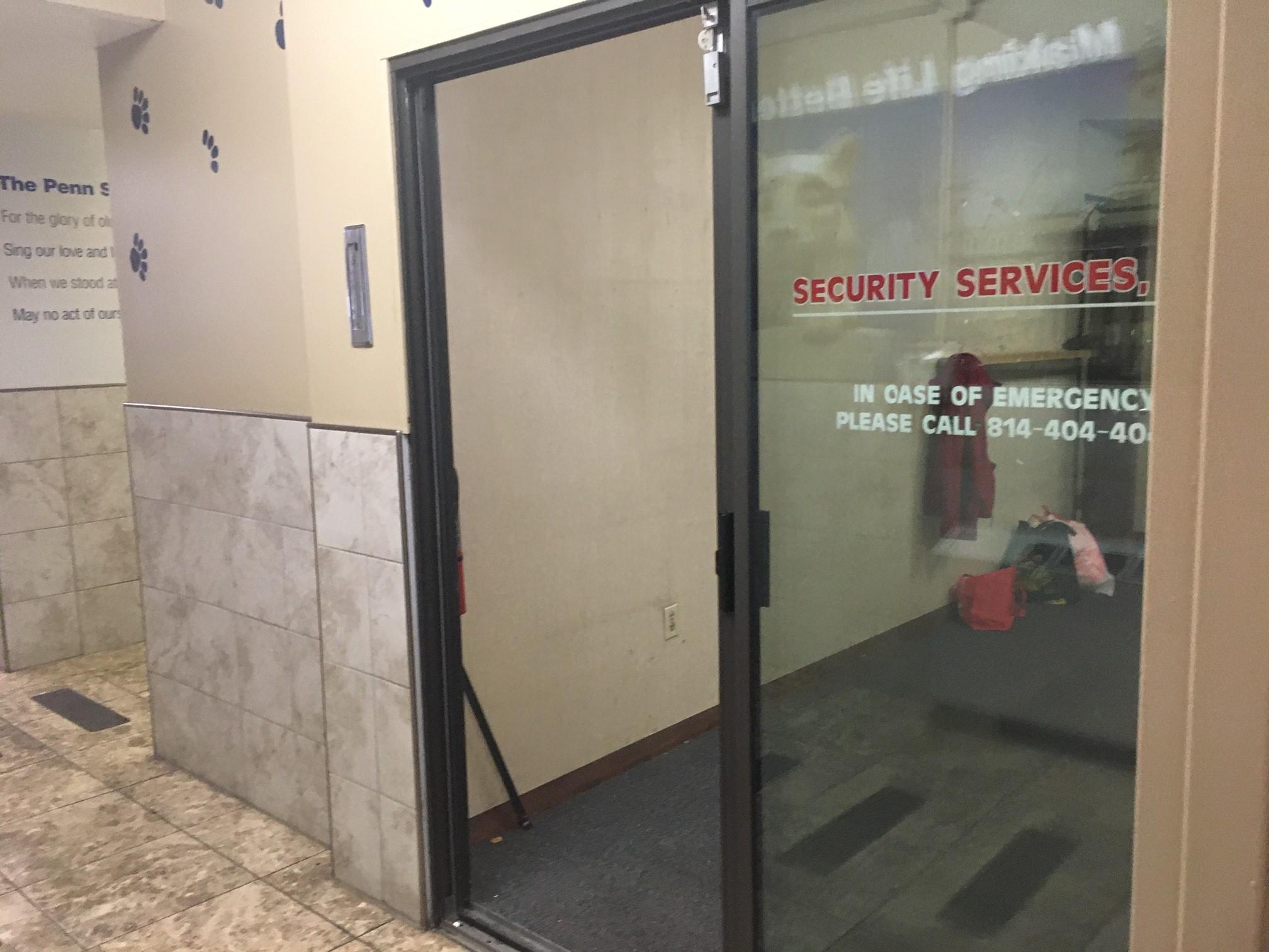 Penn Tower office interior with security services sign