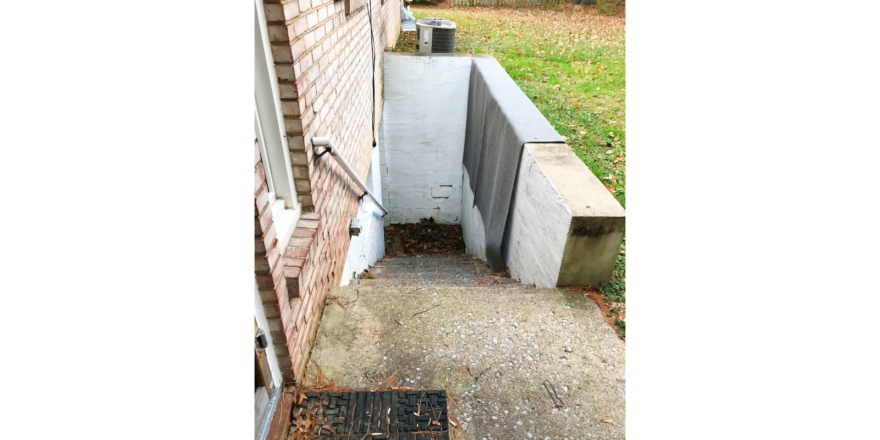 Exterior steps to the basement from the patio