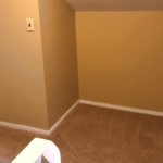 Carpeted attic alcove between two flex rooms