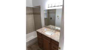 Bathroom with tub/shower combo and vanity