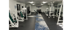 a gym filled with machines and weight machines