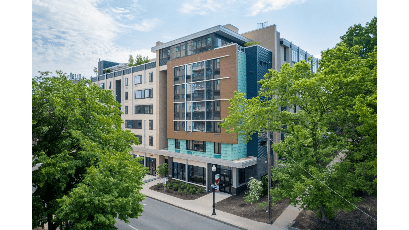 Modern apartment building with trees